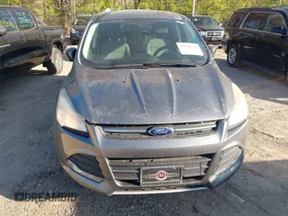 2014 Ford Escape SE z VIN 1FMCU0GX8EUC93873, wystawiony jako IAAI lot #42046040 z przebiegiem 161 269 mil mil oraz . Historia ofert i sprzedaży dostępna na DreamBid. Obrazek 6.