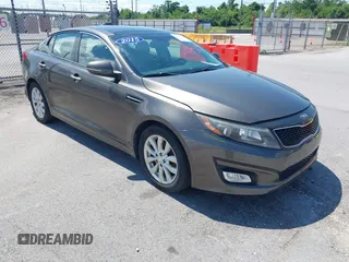 2015 Kia Optima EX z VIN 5XXGN4A73FG404775, wystawiony jako IAAI lot #42257161 z przebiegiem 104 976 mil mil oraz . Historia ofert i sprzedaży dostępna na DreamBid. Obrazek 1.