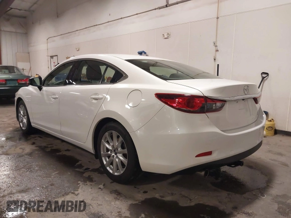 2016 Mazda Mazda6 i Sport with VIN JM1GJ1U54G1473671, listed as a IAAI auction lot 41576038 with 88,386 mi miles. Bid and sale history available at carsss.com. Image 3.