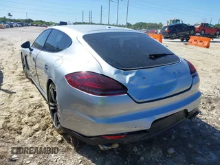 2014 Porsche Panamera S E-Hybrid with VIN WP0AD2A75EL044663, listed as a IAAI auction lot 41818381 with 44,194 mi miles and . Bid and sale history available at DreamBid. Image 6.