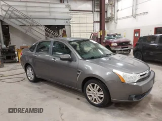 2009 Ford Focus SEL with VIN 1FAHP37N39W253086, listed as a IAAI auction lot 41825983 with 158,720 mi miles. Bid and sale history available at carsss.com. Image 1.