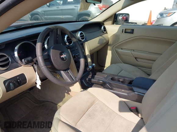 2005 Ford Mustang Deluxe with VIN 1ZVFT80N655177798, listed as a IAAI auction lot 42411831 with 112,236 mi miles and . Bid and sale history available at DreamBid. Image 5.