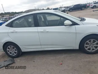 2013 Hyundai Accent GLS with VIN KMHCT4AE3DU325550, listed as a IAAI auction lot 41185651 with 128,791 mi miles and . Bid and sale history available at DreamBid. Image 13.