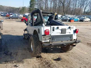 2006 Jeep Wrangler Unlimited LWB with VIN 1J4FA44S76P755148, listed as a IAAI auction lot 41774840 with 167,914 mi miles. Bid and sale history available at carsss.com. Image 3.