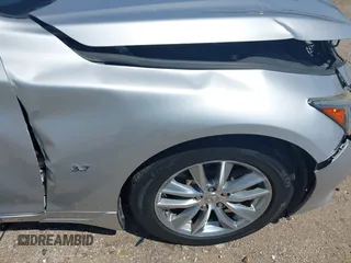 2015 Infiniti Q50 with VIN JN1BV7AR3FM405659, listed as a IAAI auction lot 41949596 with 101,196 mi miles and . Bid and sale history available at DreamBid. Image 17.