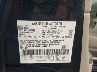 2012 Ford Escape XLT z VIN 1FMCU9DG4CKA23816, wystawiony jako Copart lot #61084425 z przebiegiem Nie podano mil oraz Szkoda całkowita • Salvage title. Historia ofert i sprzedaży dostępna na DreamBid. Obrazek 13.