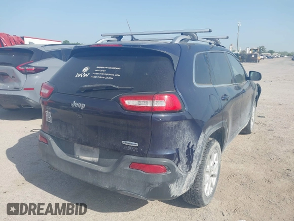 2015 Jeep Cherokee Latitude with VIN 1C4PJLCB9FW683459, listed as a IAAI auction lot 41998309 with 176,769 mi miles and . Bid and sale history available at carsss.com. Image 4.