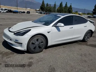 2021 Tesla Model 3 Long Range z VIN 5YJ3E1EB2MF007067, wystawiony jako Copart lot #52584715 z przebiegiem 31 311 mil mil oraz Szkoda całkowita • Salvage title. Historia ofert i sprzedaży dostępna na DreamBid. Obrazek 1.