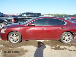 2013 Nissan Maxima S with VIN 1N4AA5AP5DC847780, listed as a IAAI auction lot 42018318 with 128,839 mi miles and . Bid and sale history available at DreamBid. Image 14.