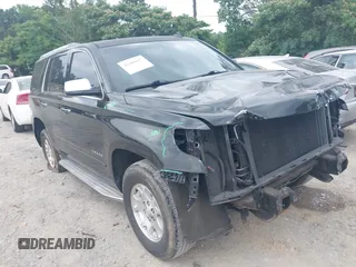 2015 Chevrolet Tahoe LTZ with VIN 1GNSKCKC5FR135692, listed as a IAAI auction lot 42400657 with 122,935 mi miles and . Bid and sale history available at DreamBid. Image 1.