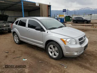 2011 Dodge Caliber Mainstreet with VIN 1B3CB3HA6BD182726, listed as a Copart auction lot 50909755 with 99,305 mi miles and Salvage Title. Bid and sale history available at carsss.com. Image 4.