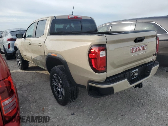 2023 GMC Canyon 4WD AT4 with VIN 1GTP6DEK3P1151112, listed as a Copart auction lot 77150454 with 5,573 mi miles and Non Repairable. Bid and sale history available at carsss.com. Image 2.