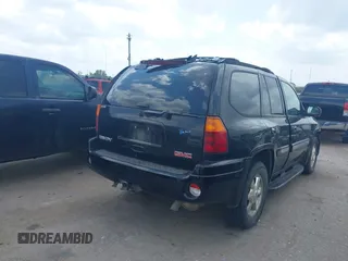 2004 GMC Envoy SLE with VIN 1GKDS13SX42398363, listed as a IAAI auction lot 42154134 with 308,001 mi miles and . Bid and sale history available at DreamBid. Image 4.