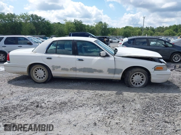 2001 Ford Crown Victoria LX z VIN 2FAFP74W81X102216, wystawiony jako IAAI lot #42388800 z przebiegiem 225 623 mil mil oraz . Historia ofert i sprzedaży dostępna na DreamBid. Obrazek 13.