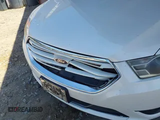 2015 Ford Taurus Limited z VIN 1FAHP2F89FG101017, wystawiony jako IAAI lot #42284459 z przebiegiem 183 167 mil mil oraz . Historia ofert i sprzedaży dostępna na DreamBid. Obrazek 6.
