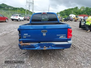 2010 Dodge Dakota Bighorn/Lonestar z VIN 1D7CW3GPXAS116883, wystawiony jako IAAI lot #42329654 z przebiegiem 90 057 mil mil oraz . Historia ofert i sprzedaży dostępna na DreamBid. Obrazek 16.