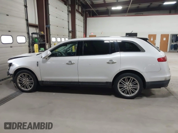 2013 Lincoln MKT EcoBoost with VIN 2LMHJ5AT3DBL56954, listed as a IAAI auction lot 41705877 with 148,771 mi miles. Bid and sale history available at carsss.com. Image 14.