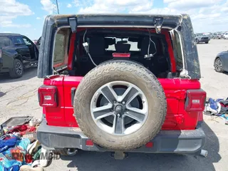 2018 Jeep Wrangler Unlimited Sahara with VIN 1C4HJXEG6JW174359, listed as a IAAI auction lot 42009968 with 79,830 mi miles and . Bid and sale history available at DreamBid. Image 20.