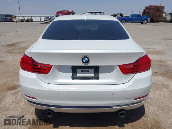 2015 BMW 4 Series 435i z VIN WBA3R1C58FK194626, wystawiony jako IAAI lot #42082585 z przebiegiem 70 619 mil mil oraz . Historia ofert i sprzedaży dostępna na DreamBid. Obrazek 16.