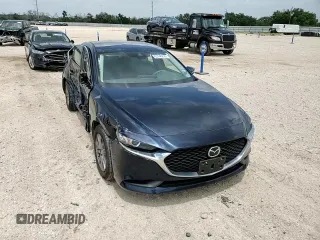 2021 Mazda 3 S z VIN JM1BPAAL3M1321131, wystawiony jako Copart lot #63148205 z przebiegiem 9 910 mil mil oraz Szkoda całkowita • Salvage title. Historia ofert i sprzedaży dostępna na DreamBid. Obrazek 13.