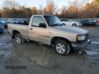 1997 Mazda B-Series 2WD Truck with VIN 4F4CR12A7VTM10371, listed as a Copart auction lot 89155465 with 97,656 mi miles and Salvage Title. Bid and sale history available at carsss.com. Image 4.