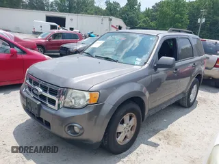 2010 Ford Escape XLT z VIN 1FMCU9DG3AKA55265, wystawiony jako IAAI lot #42414416 z przebiegiem 196 168 mil mil oraz . Historia ofert i sprzedaży dostępna na DreamBid. Obrazek 2.