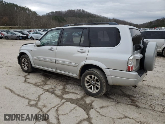 2005 Suzuki XL7 LX with VIN JS3TX92V654108114, listed as a Copart auction lot 81158564 with 130,384 mi miles and Salvage title. Bid and sale history available at DreamBid. Image 2.
