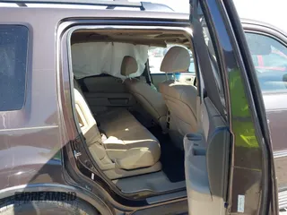 2012 Honda Pilot Touring with VIN 5FNYF4H99CB069996, listed as a IAAI auction lot 41809046 with 140,836 mi miles and . Bid and sale history available at DreamBid. Image 8.