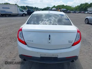 2013 Lincoln MKS EcoBoost with VIN 1LNHL9FT0DG606567, listed as a IAAI auction lot 42561162 with 285,830 mi miles and . Bid and sale history available at DreamBid. Image 16.