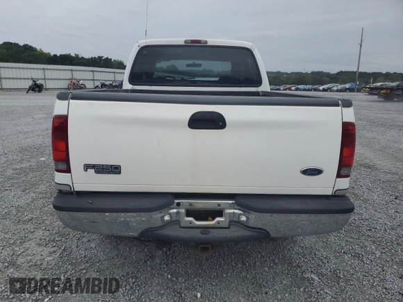 2000 Ford Super Duty F-250 XL with VIN 1FTNW21S1YED90136, listed as a Copart auction lot 71520914 with 378,931 mi miles and Salvage Title. Bid and sale history available at carsss.com. Image 6.