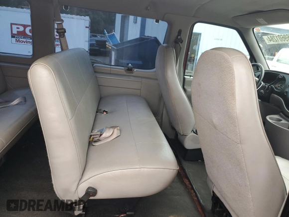 1998 Ford Econoline Wagon XL z VIN 1FBSS31L2WHB54799, wystawiony jako Copart lot #69601284 z przebiegiem 40 542 mil mil oraz Szkody całkowita. Historia ofert i sprzedaży dostępna na DreamBid. Obrazek 12.
