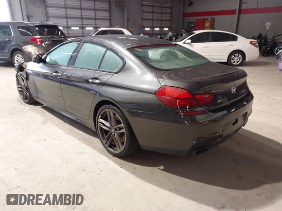 2015 BMW 6 Series 650i xDrive with VIN WBA6B4C59FD760929, listed as a IAAI auction lot 41397531 with Not Provided miles and . Bid and sale history available at carsss.com. Image 3.