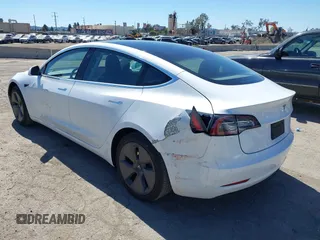 2019 Tesla Model 3 Mid Range with VIN 5YJ3E1EA1KF422983, listed as a IAAI auction lot 41861334 with 53,017 mi miles. Bid and sale history available at carsss.com. Image 3.