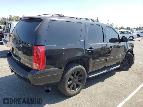 2013 GMC Yukon SLT with VIN 1GKS1CE06DR162852, listed as a Copart auction lot 71586174 with 182,169 mi miles and Salvage Title. Bid and sale history available at carsss.com. Image 3.