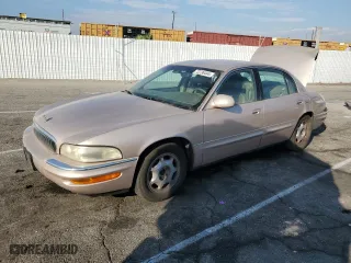 1999 Buick Park Avenue with VIN 1G4CW52K6X4653731, listed as a Copart auction lot 72736444 with 128,471 mi miles and Salvage Title. Bid and sale history available at carsss.com. Image 1.