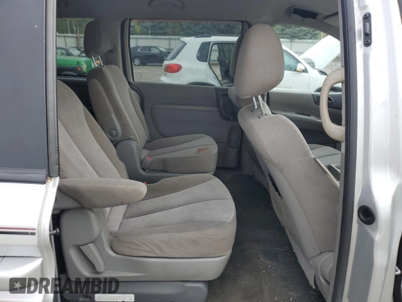 2012 Kia Sedona LX with VIN KNDMG4C79C6496785, listed as a Copart auction lot 73310344 with 130,243 mi miles and Salvage Title. Bid and sale history available at carsss.com. Image 11.