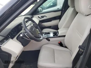 2019 Land Rover Range Rover Velar R-Dynamic SE z VIN SALYL2FV8KA233543, wystawiony jako Copart lot #50878064 z przebiegiem 75 752 mil mil oraz Szkoda całkowita • Salvage title. Historia ofert i sprzedaży dostępna na DreamBid. Obrazek 7.