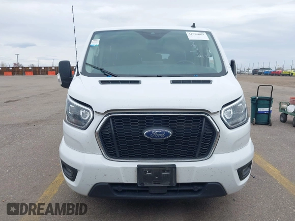 2023 Ford Transit Passenger XL with VIN 1FBAX2YG3PKA63237, listed as a IAAI auction lot 41996063 with 58,429 mi miles and . Bid and sale history available at DreamBid. Image 12.