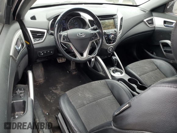 2014 Hyundai Veloster z VIN KMHTC6AD0EU188863, wystawiony jako Copart lot #54750925 z przebiegiem 96 212 mil mil oraz Szkoda całkowita • Salvage title. Historia ofert i sprzedaży dostępna na DreamBid. Obrazek 8.