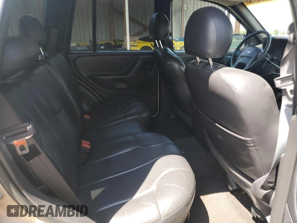 2001 Jeep Grand Cherokee Laredo z VIN 1J4GW48S61C537640, wystawiony jako Copart lot #58266135 z przebiegiem 188 475 mil mil oraz Szkoda całkowita • Salvage title. Historia ofert i sprzedaży dostępna na DreamBid. Obrazek 11.