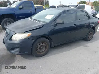2009 Toyota Corolla with VIN 1NXBU40E59Z093650, listed as a IAAI auction lot 42121575 with 166,631 mi miles. Bid and sale history available at carsss.com. Image 18.