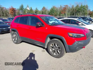 2019 Jeep Cherokee Trailhawk z VIN 1C4PJMBX7KD298488, wystawiony jako IAAI lot #40697687 z przebiegiem 127 060 mil mil oraz . Historia ofert i sprzedaży dostępna na DreamBid. Obrazek 1.