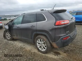 2014 Jeep Cherokee Latitude with VIN 1C4PJMCS7EW297014, listed as a Copart auction lot 48850285 with 0 mi miles and Salvage Title. Bid and sale history available at carsss.com. Image 2.
