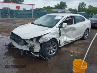 2012 Buick LaCrosse Premium 2 with VIN 1G4GF5E38CF218939, listed as a IAAI auction lot 42522959 with 210,719 mi miles and . Bid and sale history available at DreamBid. Image 18.