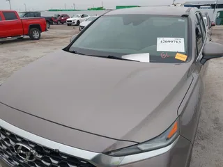 2020 Hyundai Santa Fe SEL z VIN 5NMS3CAD2LH164373, wystawiony jako IAAI lot #42099713 z przebiegiem 49 566 mil mil oraz . Historia ofert i sprzedaży dostępna na DreamBid. Obrazek 6.