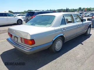 1989 Mercedes-Benz 560 with VIN WDBCA39D7KA436793, listed as a IAAI auction lot 42190980 with 141,165 mi miles and . Bid and sale history available at DreamBid. Image 4.