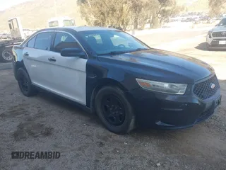 2014 Ford Police Interceptor with VIN 1FAHP2MKXEG124299, listed as a IAAI auction lot 41596172 with 118,724 mi miles and . Bid and sale history available at DreamBid. Image 1.