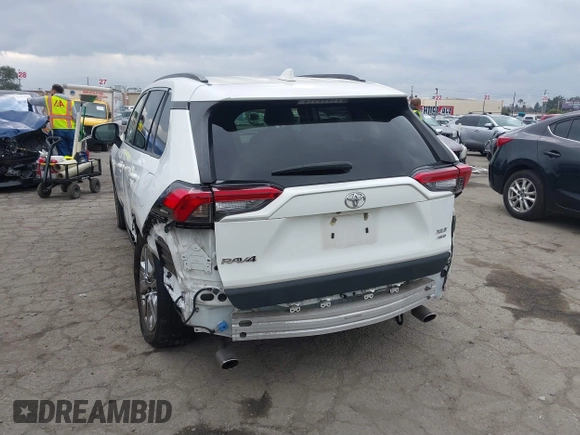 2019 Toyota RAV4 XLE Premium with VIN JTMA1RFV9KD513395, listed as a IAAI auction lot 41469143 with 28,406 mi miles. Bid and sale history available at carsss.com. Image 6.