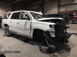 2017 Chevrolet Suburban Premier with VIN 1GNSKJKC6HR402877, listed as a IAAI auction lot 41422660 with 117,736 mi miles and . Bid and sale history available at DreamBid. Image 1.