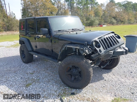 2012 Jeep Wrangler Unlimited Sport with VIN 1C4BJWDG2CL258264, listed as a IAAI auction lot 41880235 with 173,661 mi miles. Bid and sale history available at carsss.com. Image 1.